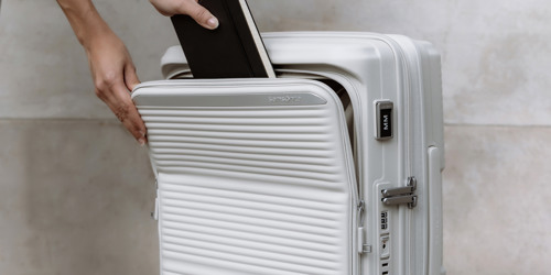 Samsonite Paralux kuffert i farven ivory. Stort udvalg af Samsonite kufferter på neye.dk