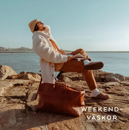 Man med weekendväska i skinn. Stort urval av weekendväskor på neye.se